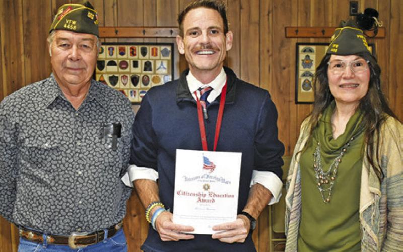 CALDWELL HIGH SCHOOL teacher Benjamin Kasparek was the VFW’s Teacher of the Year as part of the Smart/Maher VFW National Citizenship Education Teacher Program. He is joined by Tommy Miles and Tina Smith of the Caldwell VFW post.