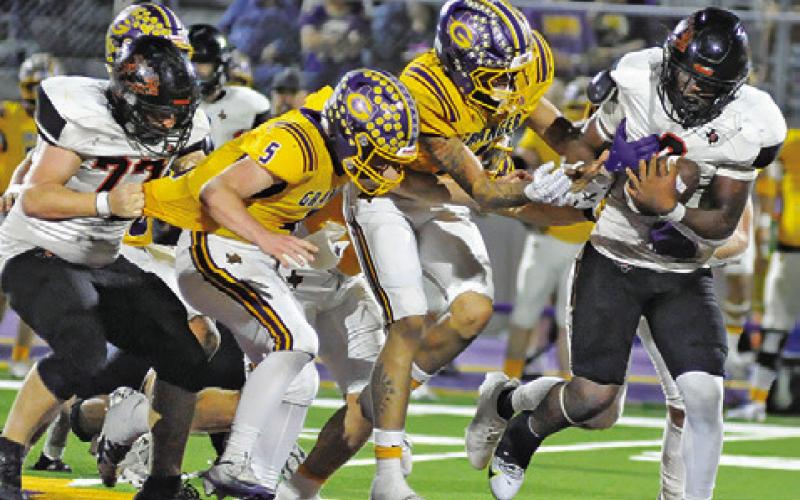 JA’KEITH DANIELS OF Somerville carries the ball against Granger. Tribune photo by Denise Squier