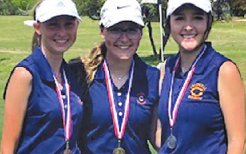 THE CALDWELL GIRLS golf team took the top three individual medalist spots at the district golf tournament. Pictured, from left, are Maegan Schneider (third), Hannah Blaha (first) and Priscilla Olivarez (second).