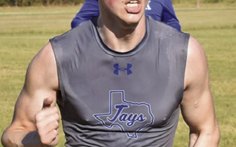 SNOOK’S ETHAN Janac won the boys varsity race at the District 26-2A Cross Country Meet last week in Caldwell. Tribune photo by Roy Sanders