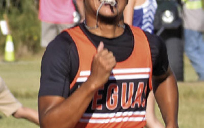 SOMERVILLE’S X’ZAVION VELA sprints to the finish line, placing sixth in the varsity boys race at the District 26-2A Cross Country Meet. Vela advanced to the regional meet. Tribune photo by Roy Sanders