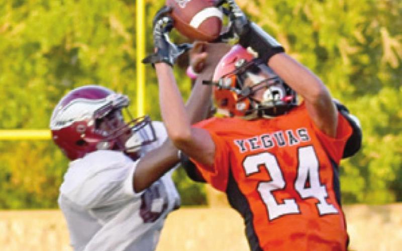 GARDNER SHIVERS makes a play for Somerville against Hearne last Friday.