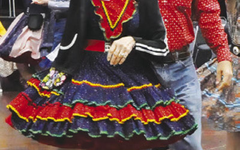AREA SQUARE DANCERS put on an exhibition last week at the Caldwell Civic Center, including dancing with area children. Tribune photo by Denise Squier