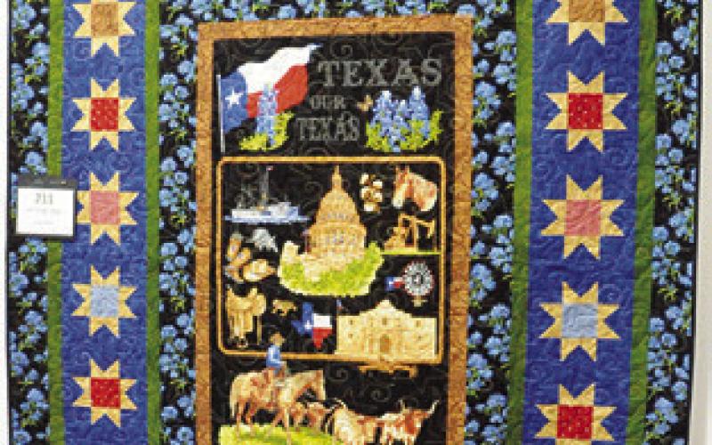 PATRIOTIC QUILTS and those about the State of Texas were displayed at this year’s Creative Memories Quilt Guild Quilt Show. Tribune photo by Denise Squier