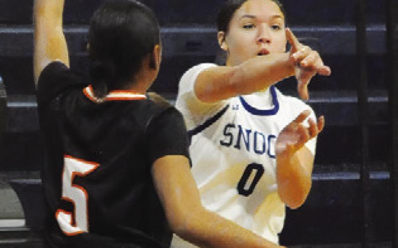 JADEYN LARA PASSES the ball to a teammate during the Snook-Smithville game last Tuesday afternoon in Snook. Tribune photo by Denise Squier