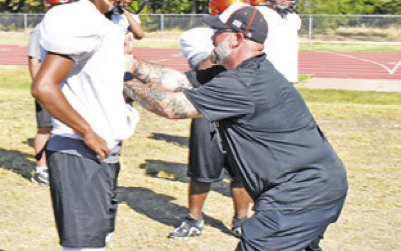 DEMONSTRATIONS on blocking and more were featured during last week’s Yegua football practice. -- Tribune photo by Roy Sanders.