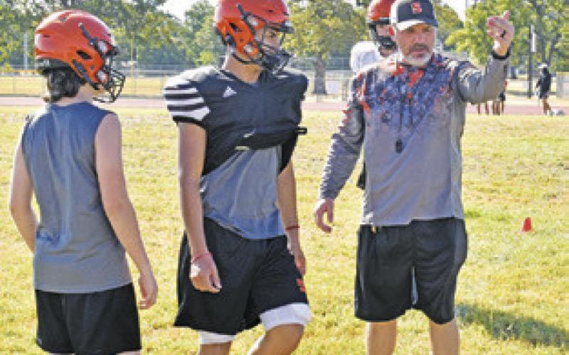 SOMERVILLE YEGUA FOOTBALL players get instruction during football practice last week. Tribune photo by Roy Sanders