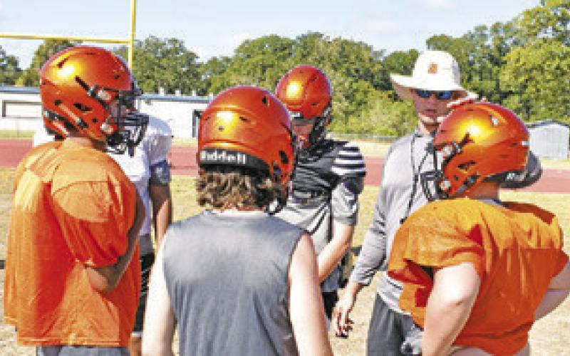 THE SOMERVILLE YEGUAS get a pep talk during football practice last week. -- Tribune photo by Roy Sanders