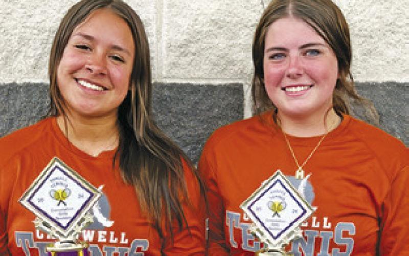 HANNARAE CLARK and Miranda Polasek were the consolation champions for girls doubles at the Thrall Invitational Varsity Tennis Tournament last week.