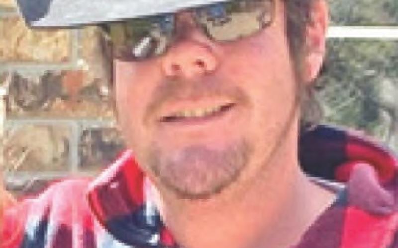 DUSTIN “BUSTER” SMITH