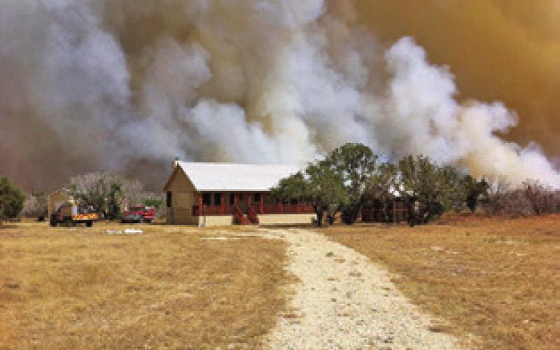 TEXAS A&amp;amp;M FOREST Service and local fire departments respond to a wildfire in Central Texas. Photo courtesy of Texas A&amp;amp;M Forest Service