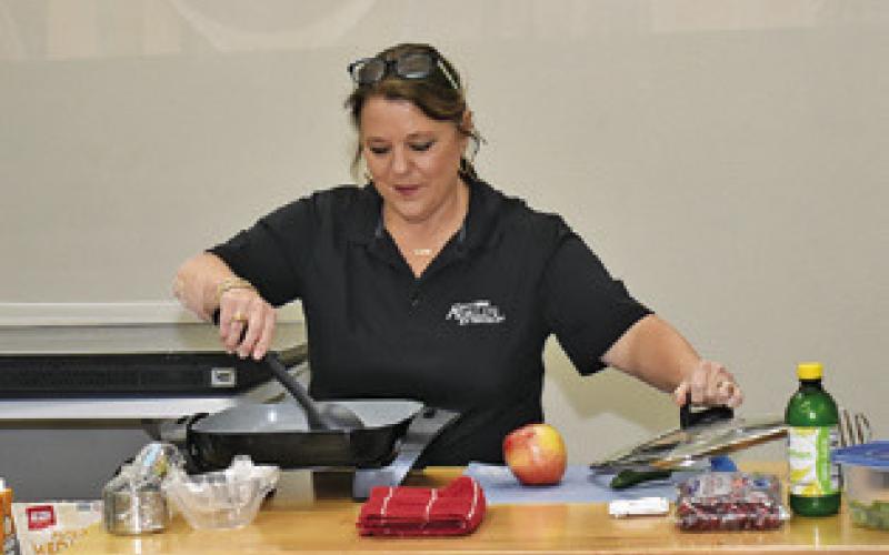 HOLLY NARRO OF the Burleson County Extension Office leads a Friday, Oct. 31, session called “Cooking Well for a Healthy Blood Pressure” at the county extension office.