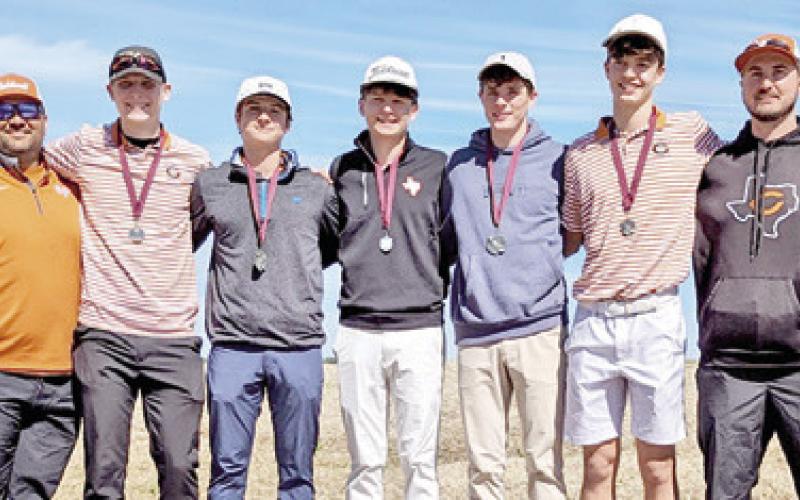 THE CALDWELL BOYS team includes, from left, coach Marcus Escalante, Harrison Novak, Caden Schluens, Cobey McCuller, Nathan Scott, Grant McManus and Coach Jacob Schaefer.