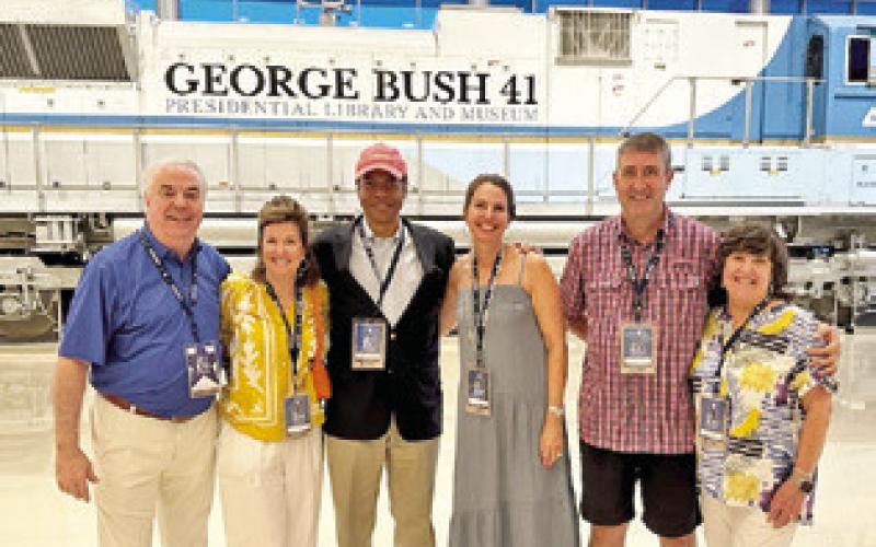 TONY AND LIA Zaccagnino, right, are joined by friends at the Bush celebration. They visited with colleagues from the administration.