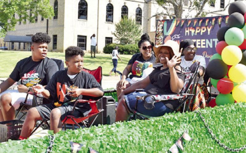 MACEDONIA BAPTIST CHURCH in Caldwell greets the crowd on Saturday during the Juneteenth Parade in downtown Caldwell.