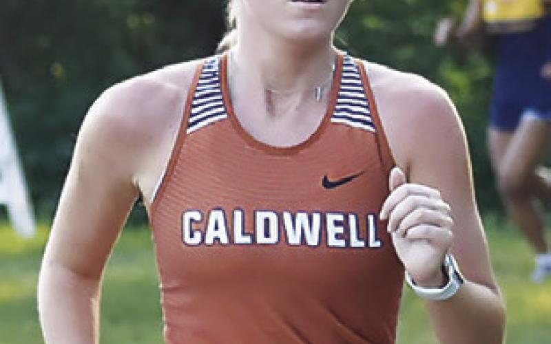CALDWELL’S HANNAH Muzny finished eighth at last Saturday’s Caldwell Cross Country Invitational at Davidson Creek. Tribune photo by Roy Sanders