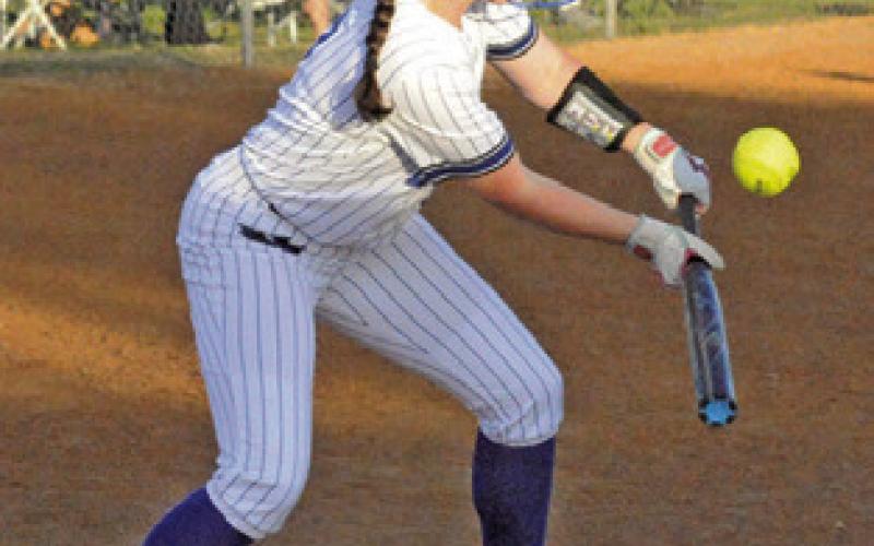 KYLIE COOPER BUNTS during the Snook-Somerville game last Friday in Snook. Tribune photo by Denise Squier