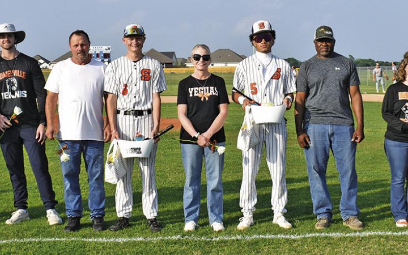 THE SOMERVILLE HIGH SCHOOL baseball team’s senior recognition was held on Friday, April 24, prior to the Milano game. Players recognized included Christian Esqueda, Gage Tuck, Kyle Brooks and Colt Holton. Pictured above, from left, are Coach Loagan Naiser, Esqueda, Coach James Klingler, George Tuck and Gage Tuck, Brandee Brooks, Kyle Brooks and Lee Brooks, and Doree Holton, Colt Holton and Eric Holton.