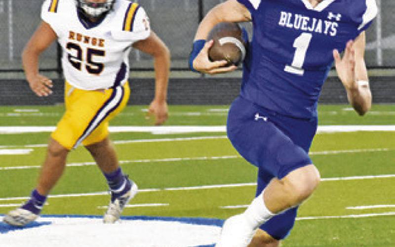 SNOOK’S LIAM Zequeria runs for a touchdown against Runge. Snook won 52-6.