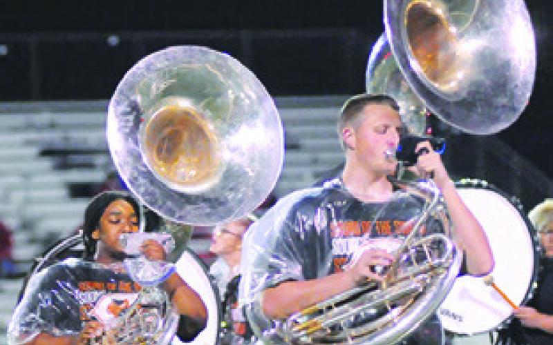 TUBA PLAYERS in the Caldwell High School Band performed patriotic music during halftime of the Caldwell-Bellville game last Friday night at Hornet Stadium. Tribune photo by Denise Squier