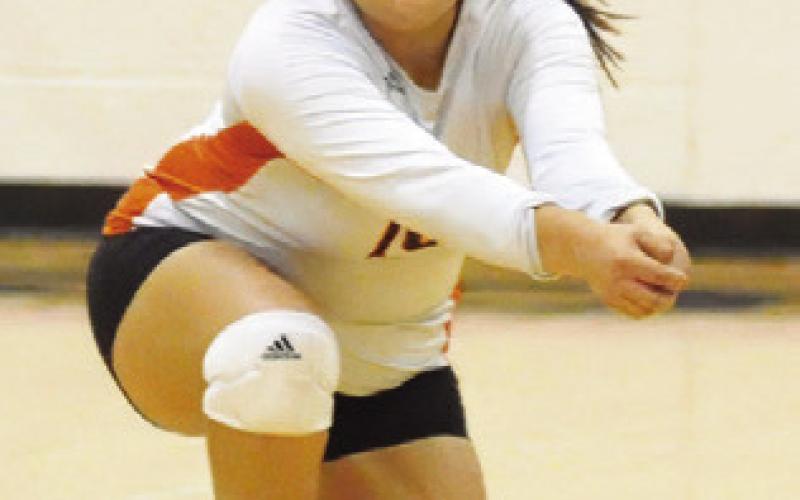 VIVIANNA MUNOZ lunges to return the ball during the Somerville-ILTexas match last Friday night in Somerville. Tribune photo by Denise Squier