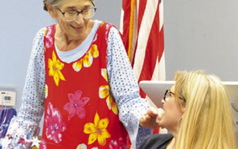 BURLESON COUNTY Democrat Linda Adair welcomes US Congressional candidate Theresa Boisseau during a dinner on Thursday. Tribune photo by Denise Squier