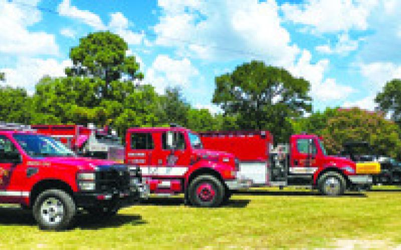 THE SNOOK VOLUNTEER FIRE DEPARTMENT held its annual barbecue fundraiser on Sunday at the Snook SPJST Hall, selling out of the barbecue plates by 12:30 p.m. Tribune photo by Denise Squier