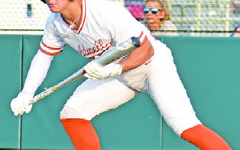 BLANE GARZA prepares to bunt for Caldwell in game one of the area playoff against Salado.