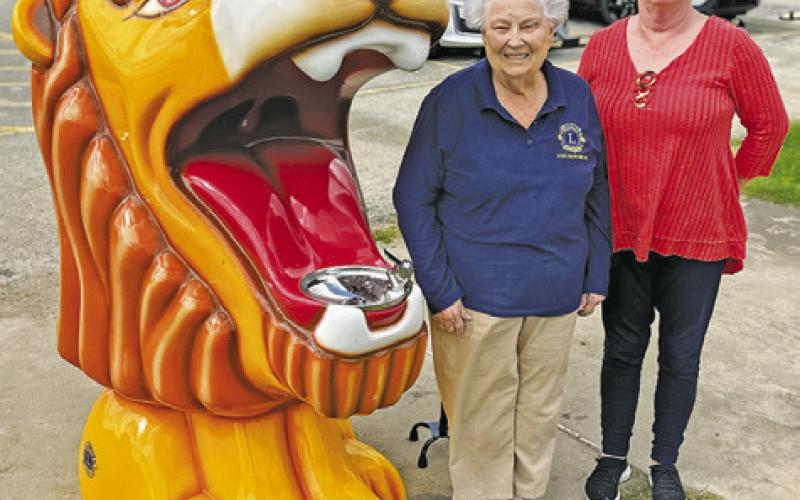 THE CALDWELL BURLESON County Lions Club donated this lion water fountain to Davidson Creek Park. The organization purchased it with funds raised from the annual Denim And Dancing event along with The Lions Foundation. It is located by the playscape. Pictured next to the fountain are Jessie Bryan and Jaque Bray.