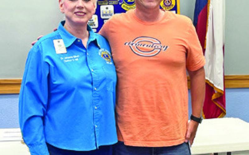 CBC LIONS PRESIDENT Johanna Elliott presents checks for the Intermediate and Elementary schools to Principal Andrew Ganrud this past Thursday.