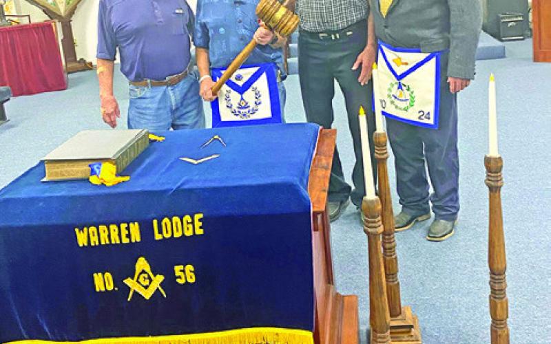 JACK WOMACK, WORSHIPFUL MASTER at Lee Scott Masonic Lodge in Somerville, and Jim Braml, Junior Warden; Charlie Law, Secretary; and Steve McCoy, Senior Deacon and District Deputy Grand Master at large, visited Warren Lodge in Caldwell and brought home the traveling gavel for District 44.