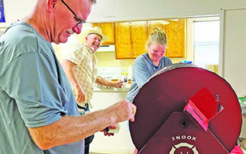 THE SNOOK VOLUNTEER Fire Department also held a raffle during their barbecue dinner fundraiser on Sunday. Tribune photo by Denise Squier