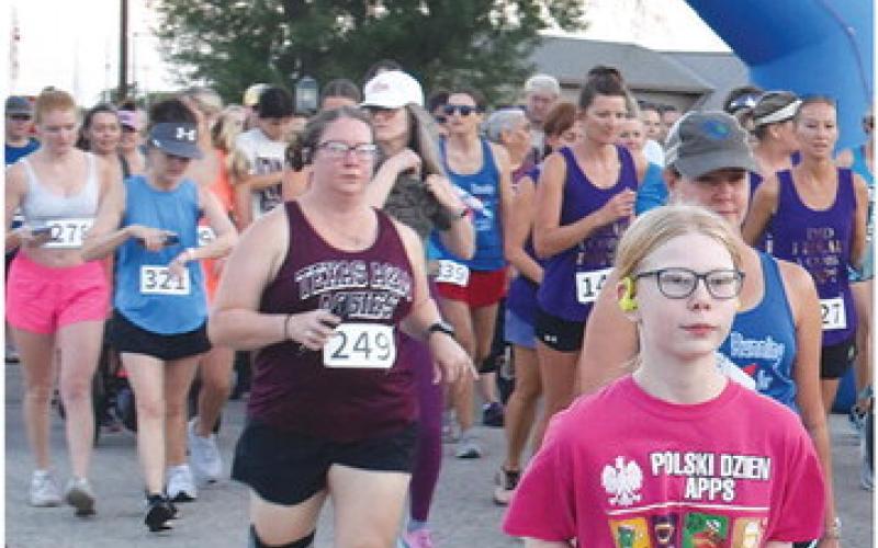 THE 5K RUN begins early Saturday morning to kick off the annual Kolache Festival. -- Tribune photo by Roy Sanders