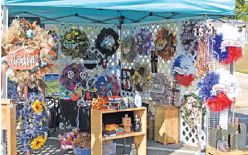 ARTS AND CRAFT booths like these were enjoyed by visitors on Saturday at the Kolache Festival. -- Tribune photo by Roy Sanders