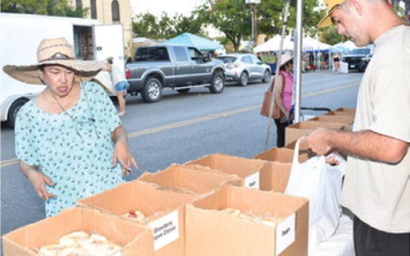 KOLACHE SALE VENDORS did well on Saturday at the Kolache Festival in downtown Caldwell. -- Tribune photo by Roy Sanders