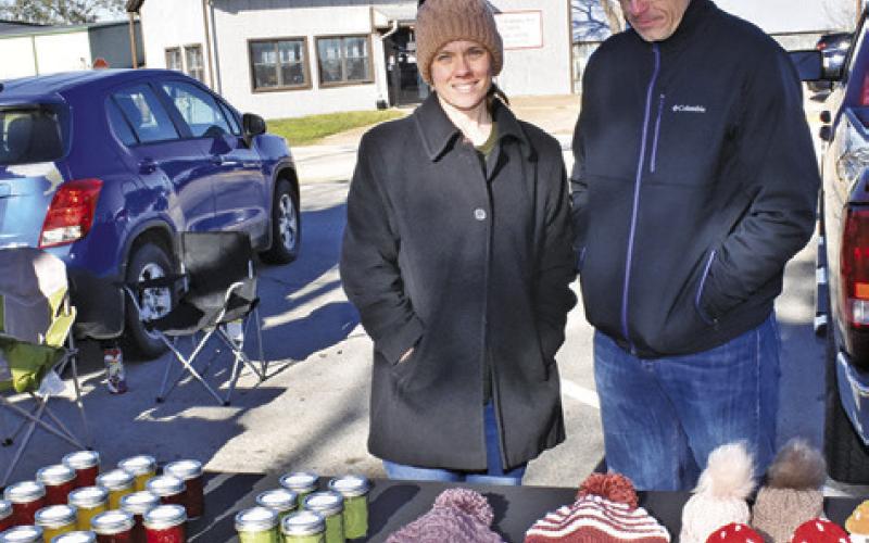 VENDORS WITH H&amp;amp;L Preserved display their product on Saturday, Jan. 11, at the farmers market in downtown Caldwell.