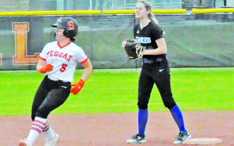 SOMERVILLE’S AVERIE HERNANDEZ ROUNDS second base during the Lady Yegua’s 14-0 win over Brazos Christian last Thursday.