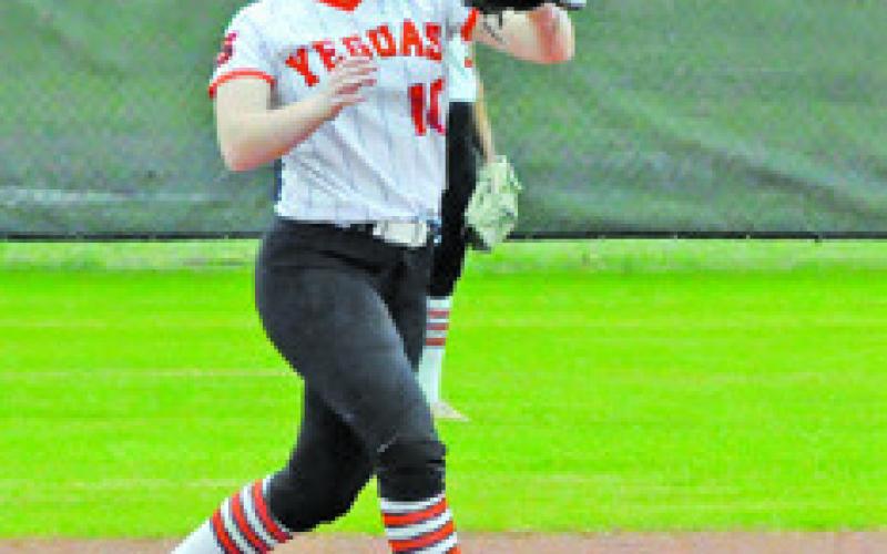 ABIGAIL FLENCHER sets to step on second base to throw to first for a double play during the Somerville-Brazos Christian game last week. -- Tribune photo by Denise Squier