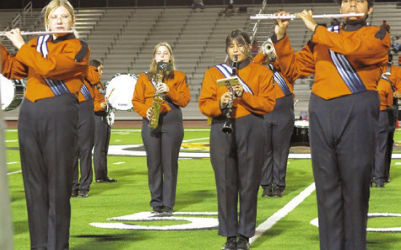 PICTURED ARE MEMBERS of the Caldwell High School Marching Band woodwind section performing during the Caldwell-Cuero halftime last Friday night in Cuero. -- Tribune photo by Denise Squier