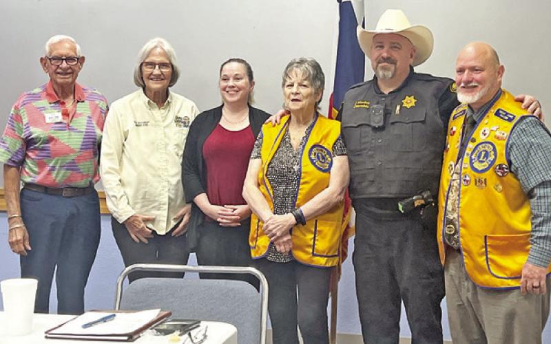 PAST INTERNATIONAL DIRECTOR JOE Al Picone inducts three new members into the Caldwell Burleson County Lions Club. Pictured are PID Joe Al, Sponsor Pat Drouilhet, new members Kelli Coleman, Kathy Tollefson, Jason Rhodes, and Club President-Sponsor Ken Wiltz.