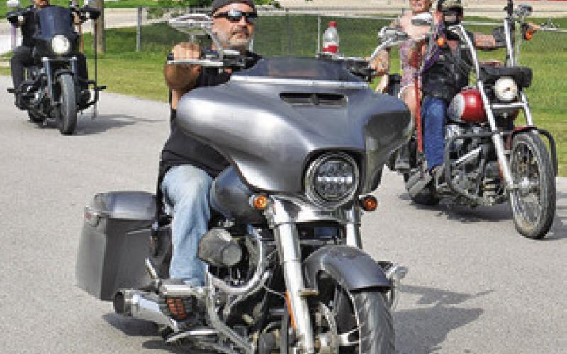 THESE BIKERS JOIN the parade on Saturday morning on Eighth Street in Somerville as part of the Crater Motorcycle Rally.