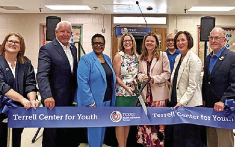 SEN. LOIS KOLKHORST, second from the right, attends the ribbon cutting ceremony for the newly created Terrell Youth Center.