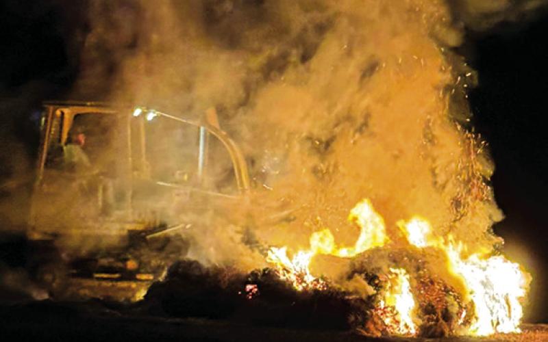 THE FIRE BURNS last Monday night, June 1, off F.M. 1361 near Davidson Creek. Photo courtesy of Snook VFD