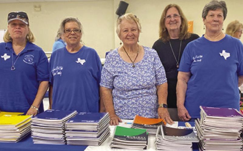 LYONS EDUCATION EXTENSION Association Club donated spiral notebooks to the “Back to School Blast.” Pictured, from left, are, Terri Sissoms, Tammy Qualls-Tucker, Sharon Stevenson, Debbie Schumacher and Brenda Kolojaco. Photo courtesy of the Lyons EEA