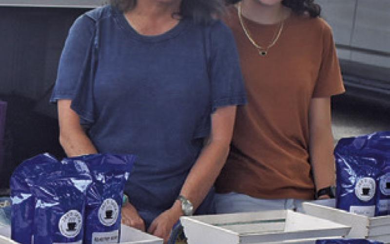 JULIE AND TANNA Boykin of Jay’s Java display their coffee at the Farmers Market on Saturday, June 6, in downtown Caldwell.