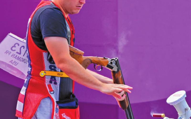 CALDWELL’S PHILLIP JUNGMAN reloads his shotgun during the Men’s Skeet shooting event at the 2020 Tokyo Olympics at the Asaka Shooting Range. Jungman finished 15th in the qualifying rounds for Team U.S.A. -- Photo courtesy of U.S. Army Marksmanship Unit