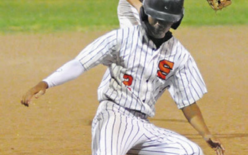 KALEB LEANG of Somerville tags third base in the Fayetteville game. -- Tribune photo by Denise Squier