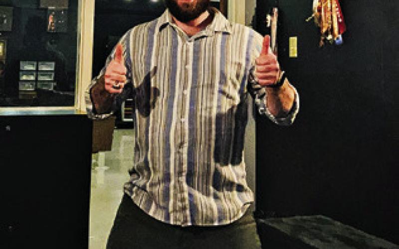 CALDWELL HIGH SCHOOL THEATRE teacher and playwright Chase Owen in his classroom. Photo courtesy of Chase Owen