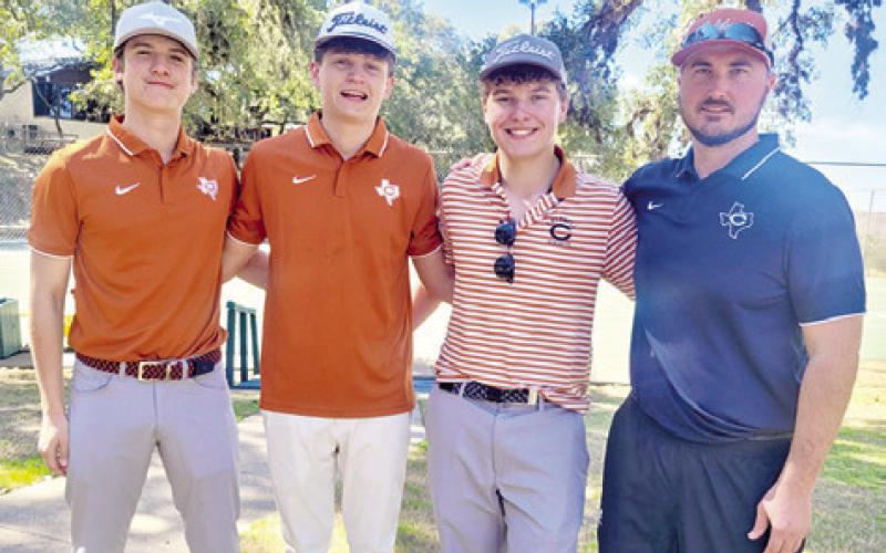 THE CALDWELL HIGH School boys team includes, from left, Caden Schluens, Cobey McCuller, Kaden Fritsche and Coach Jacob Schaefer.