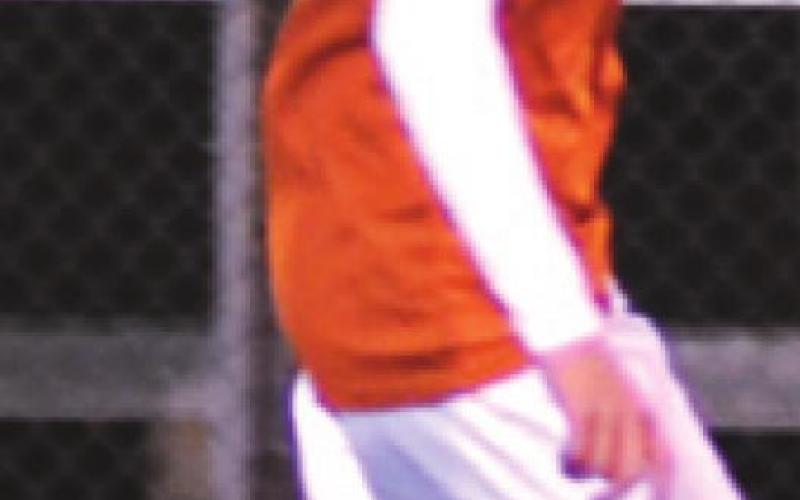 APOLLO VAVRA DRIBBLES the ball down the field during the Caldwell-Bellville game.